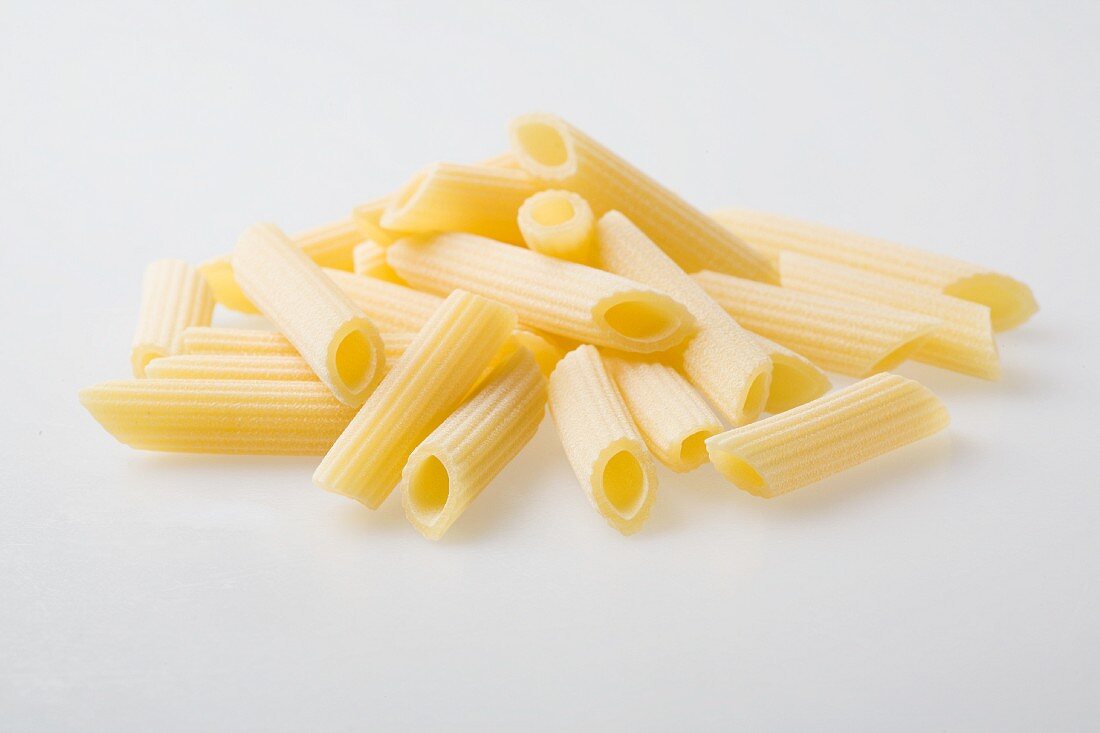 A pile of fresh Penne Rigate pasta