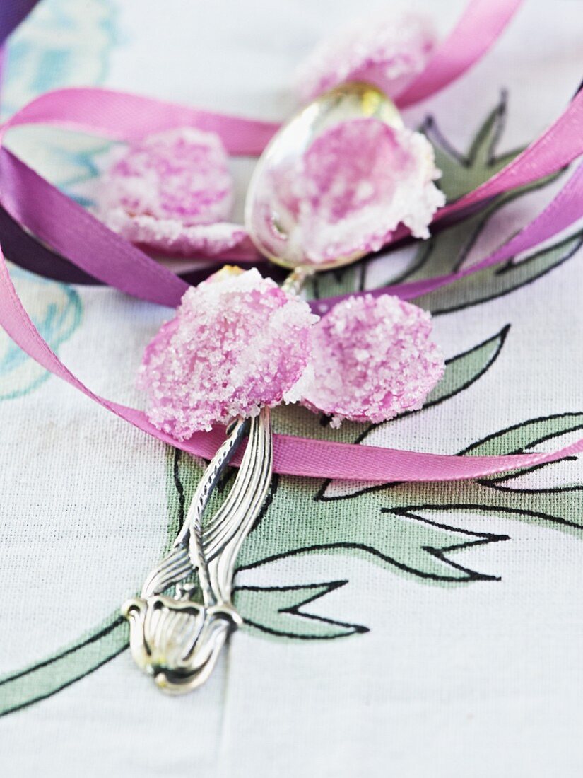 Sugared rose petals with an ice cream spoon