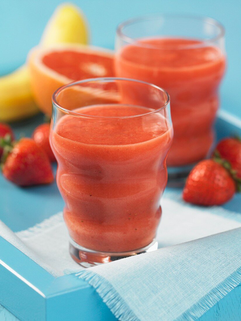 Fruit juice with strawberries, banana and grapefruit