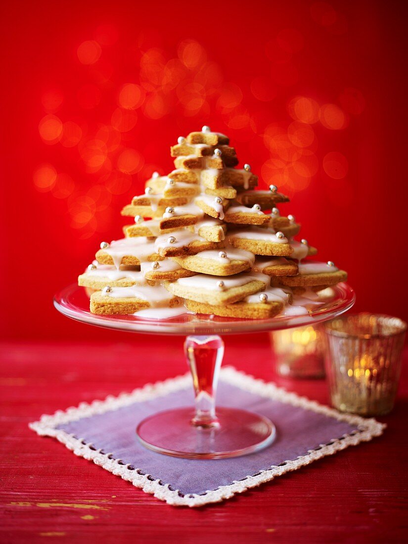 Shortbread biscuits stacked on a cake stand in the shape of a Christmas tree