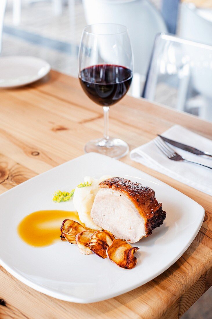 Roast pork with potato and quince purée