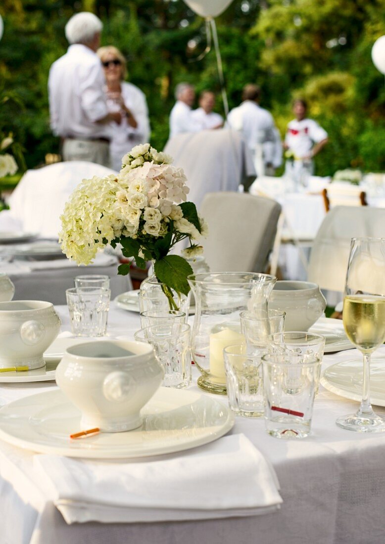 A table laid for a summer garden party