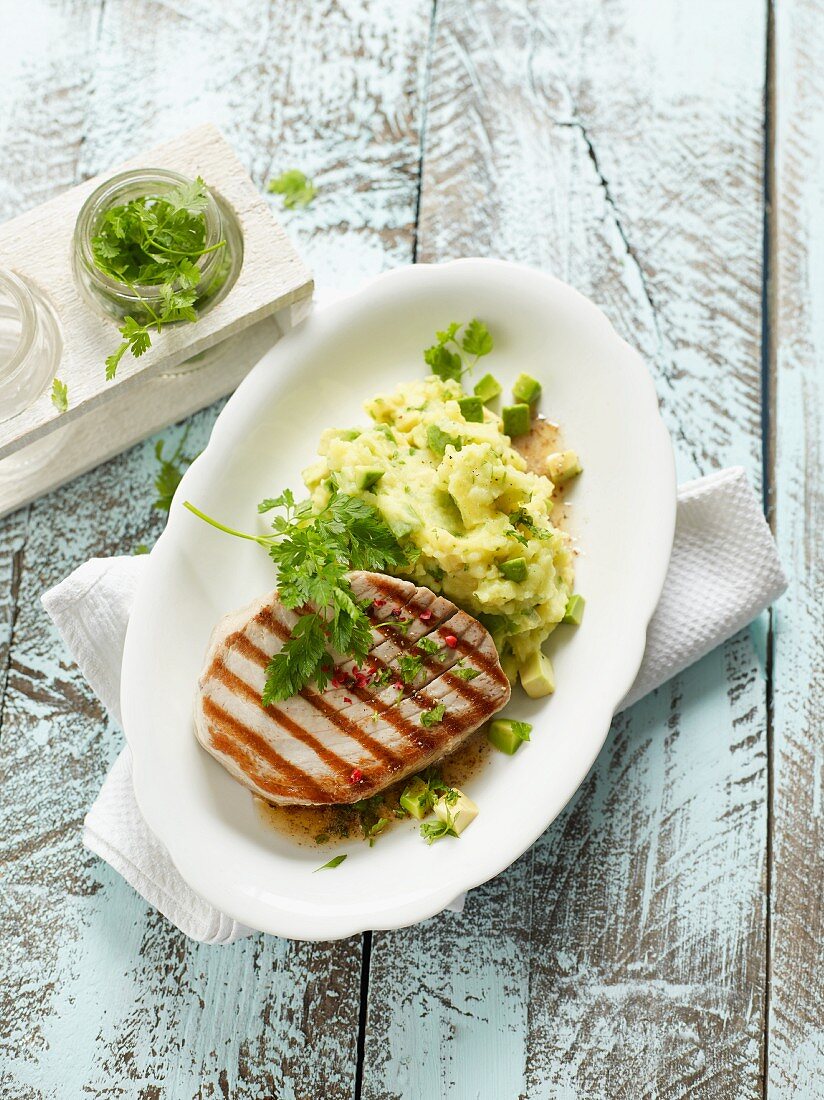 Grilled tuna fish with potato and avocado purée