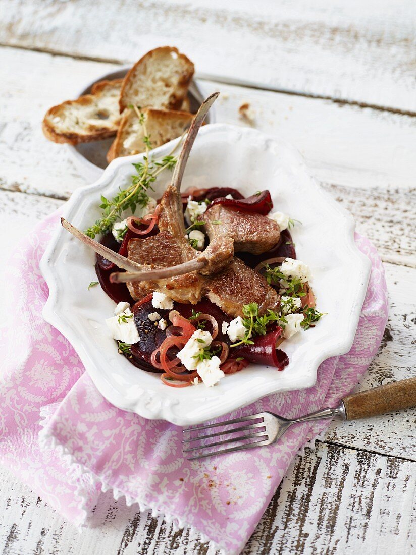 Lamb chops on a bed of beetroot