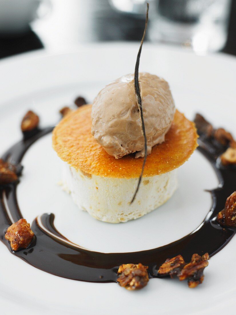 An ice cream towel with sponge cake and chocolate garnish