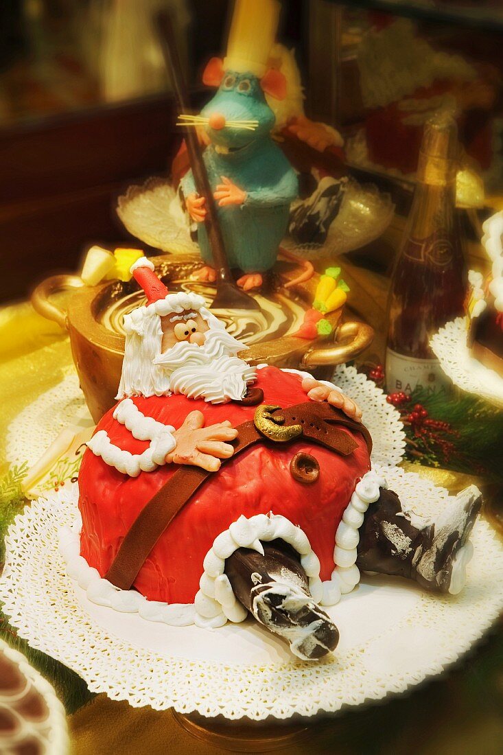 A funny Father Christmas cake in a shop window