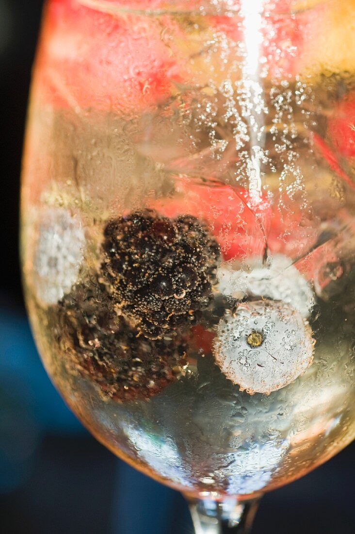 A Prosecco cocktail with berries