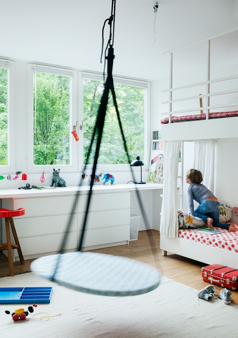 Child s bedroom with swing suspended License image 11297053