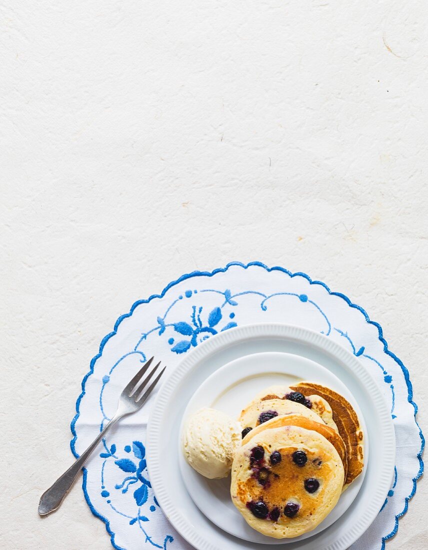 Blueberry pancakes with vanilla ice cream