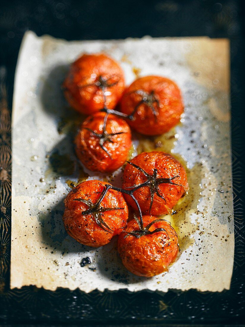Roasted tomatoes on a baking tray