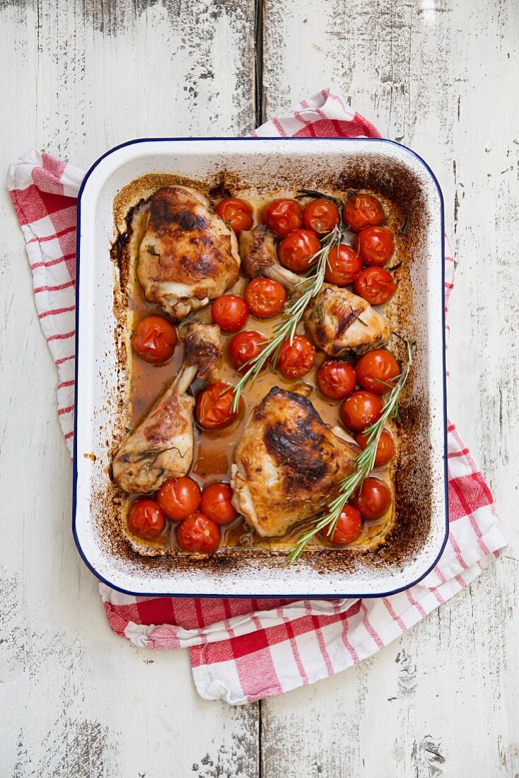 Roast chicken with rosemary and tomatoes