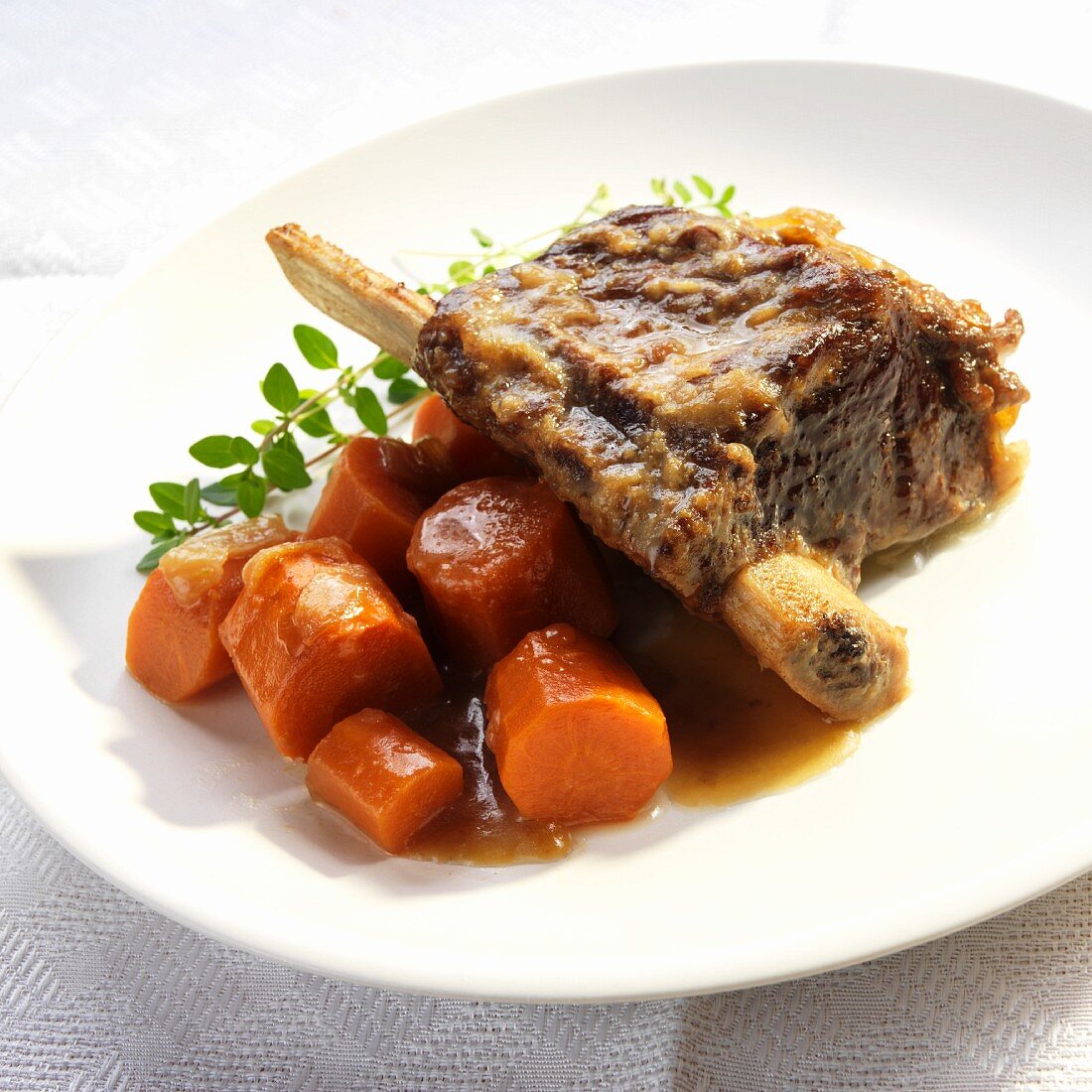 Beer-braised beef ribs with carrots, onions and celery