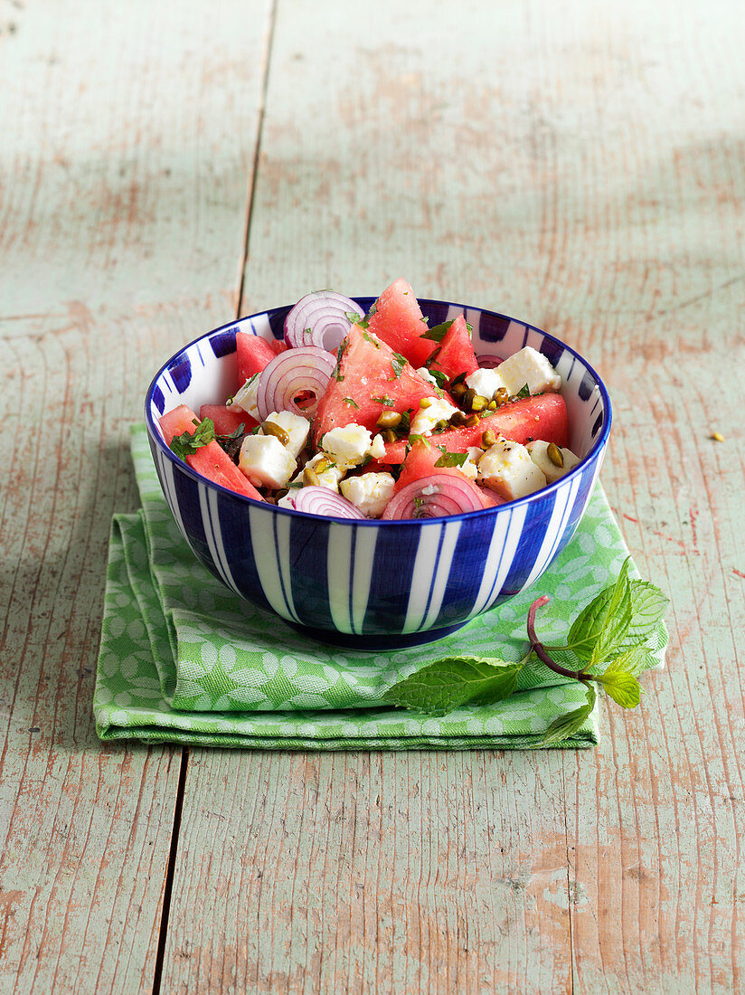 Water melon salad with onions and feta