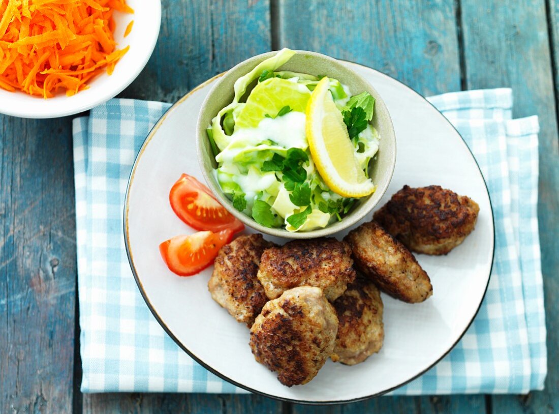 Meat patties with a carrot and cabbage salad