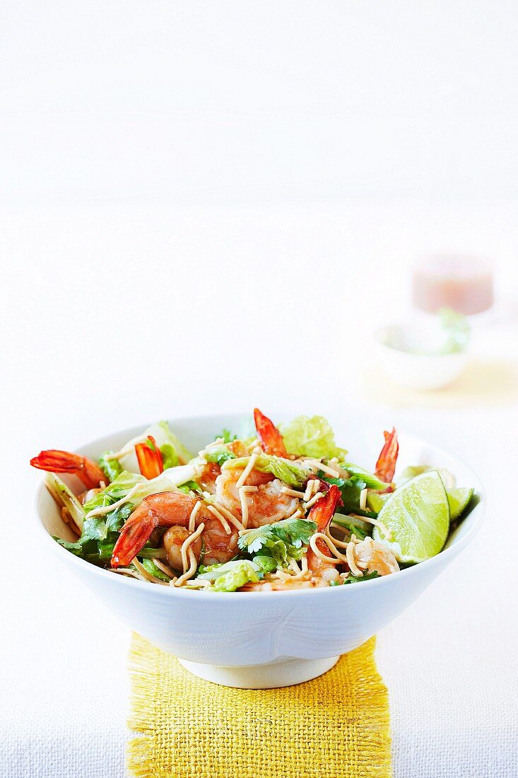 Warm pasta and prawn salad