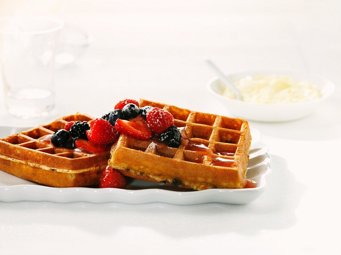 Fresh waffles with berry salad