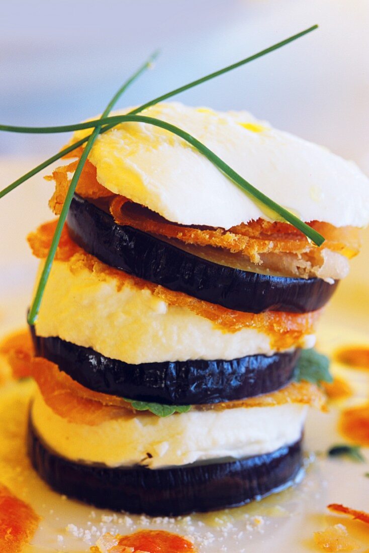 A stack of aubergine slices with cheese (Italy)