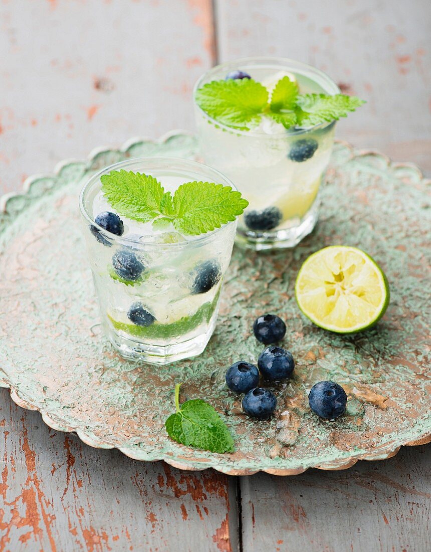 Limeade with blueberries and lemon balm