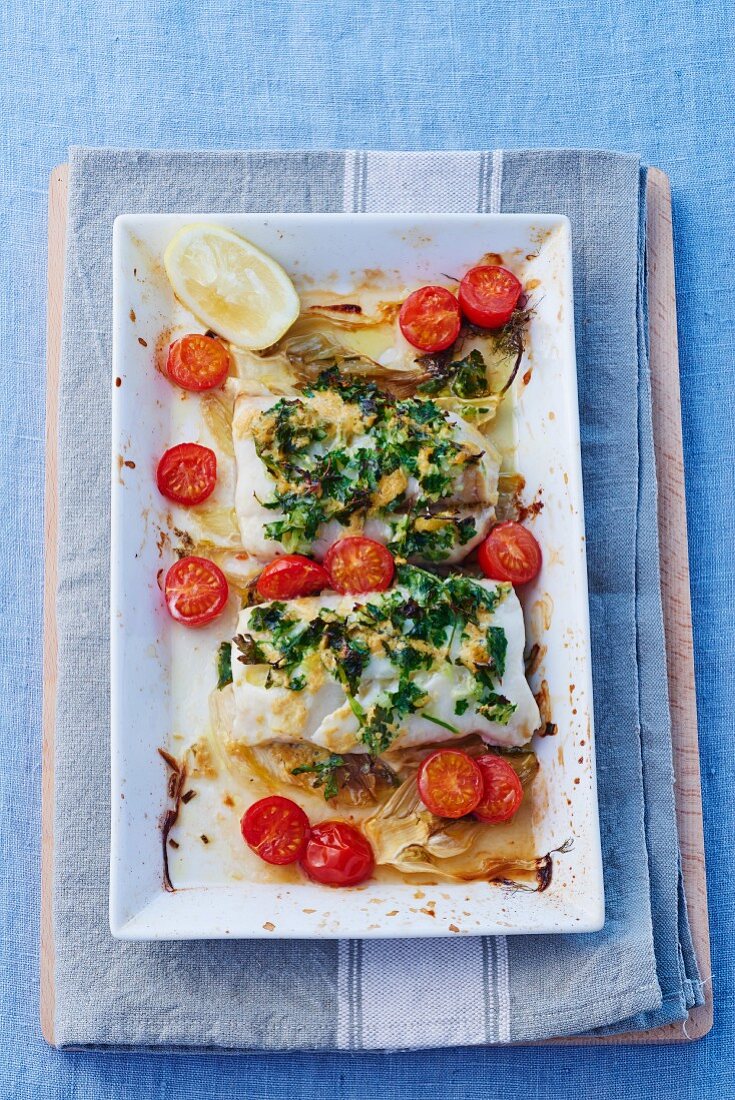 Cod with cherry tomatoes, herbs and lemon