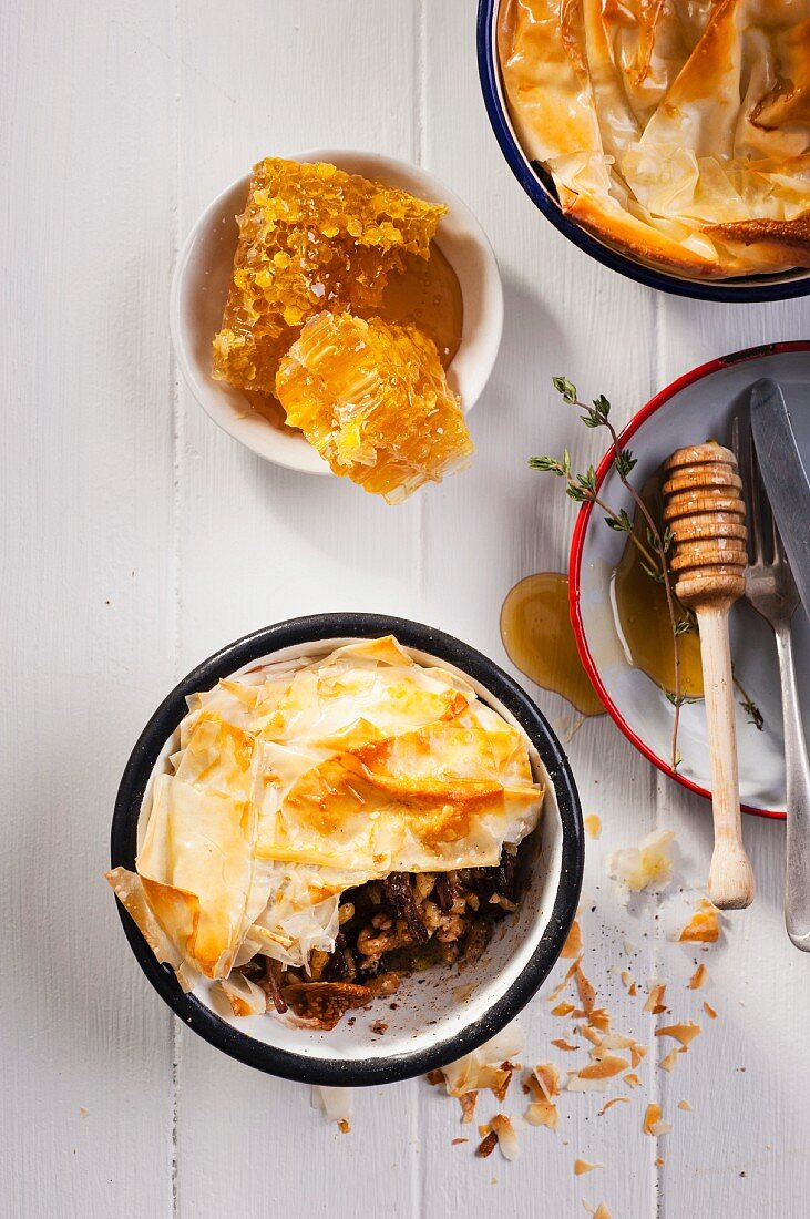 Beef stew with honey, walnuts and a puff pastry topping