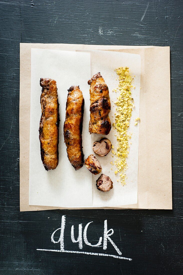Duck and cherry sausages with pistachio nuts