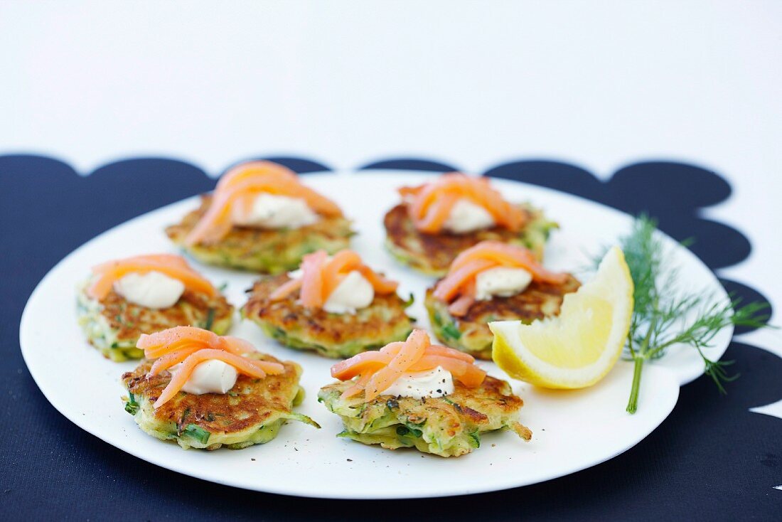 Courgette fritters topped with smoked salmon
