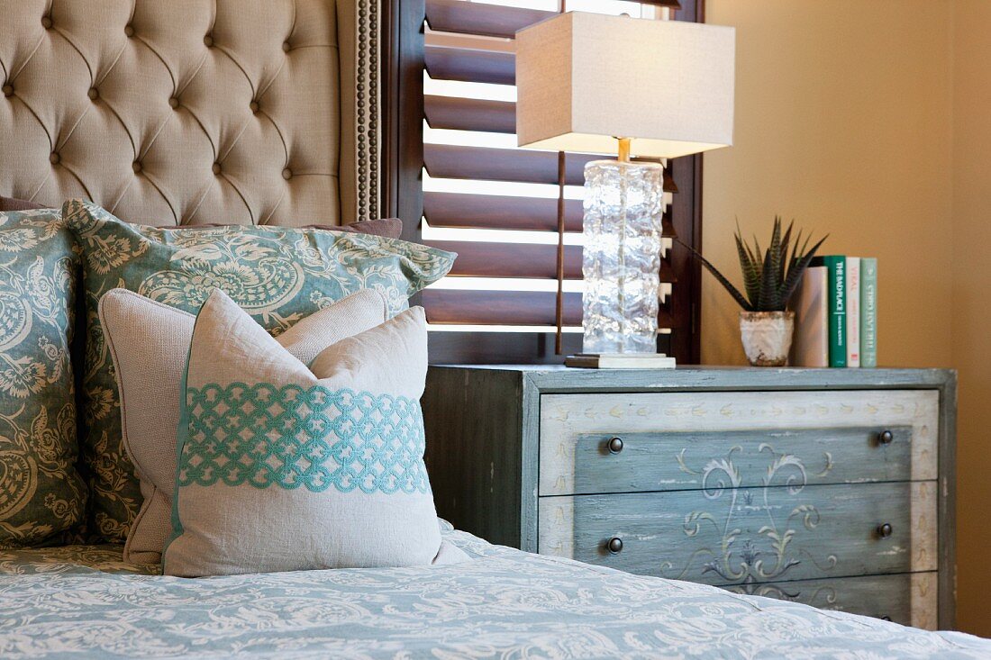 Lamp, bedside table and bed; Valencia; California; USA