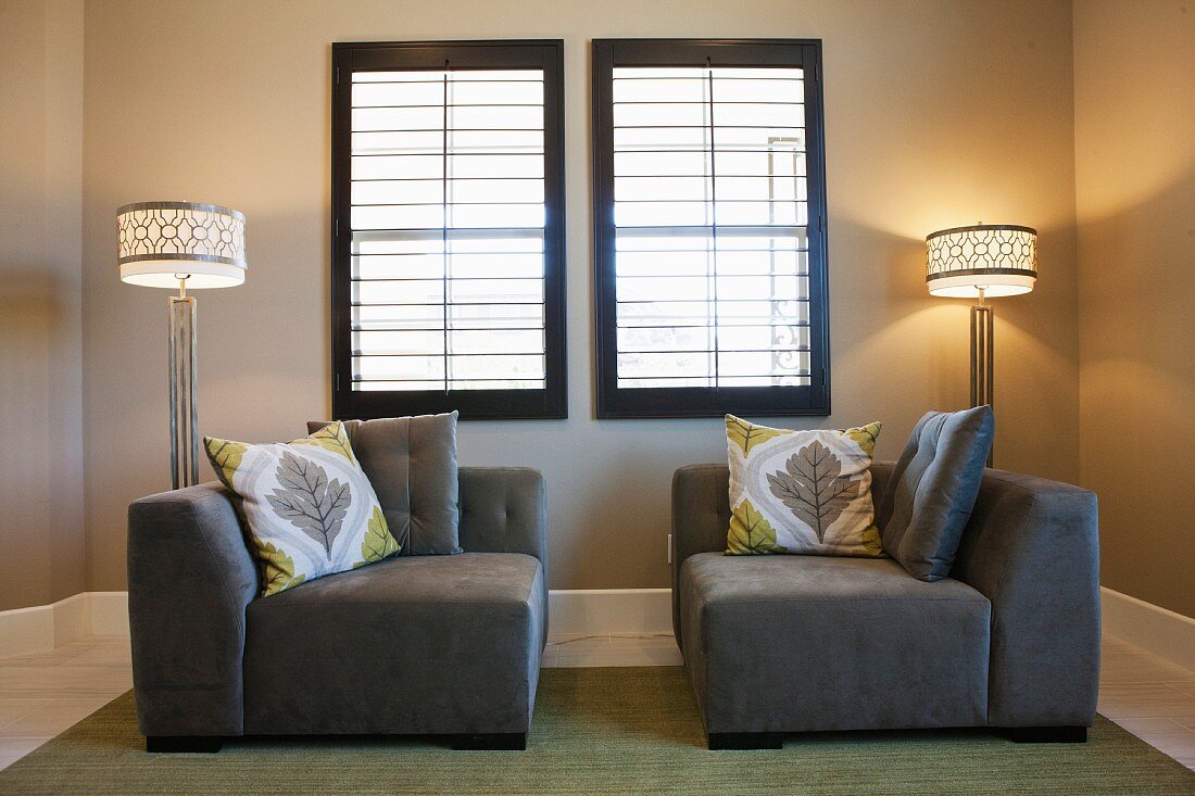 Floor lamps and seating below window; Valencia; California; USA