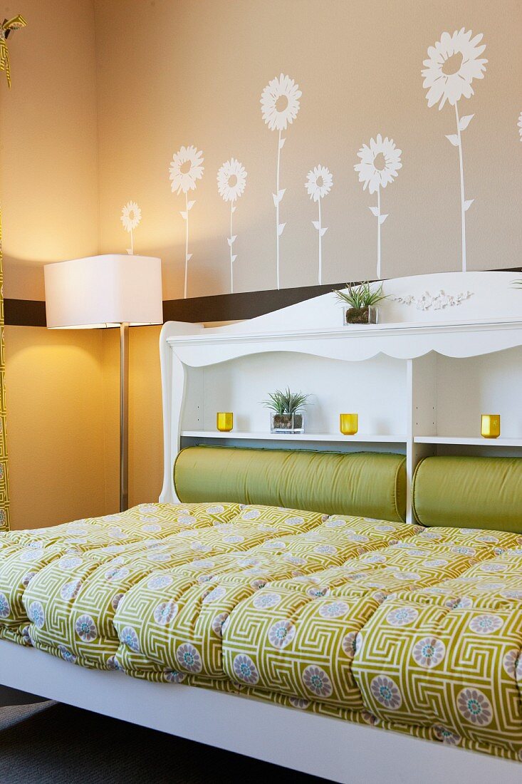 Bed with shelving in headboard; Valencia; California; USA