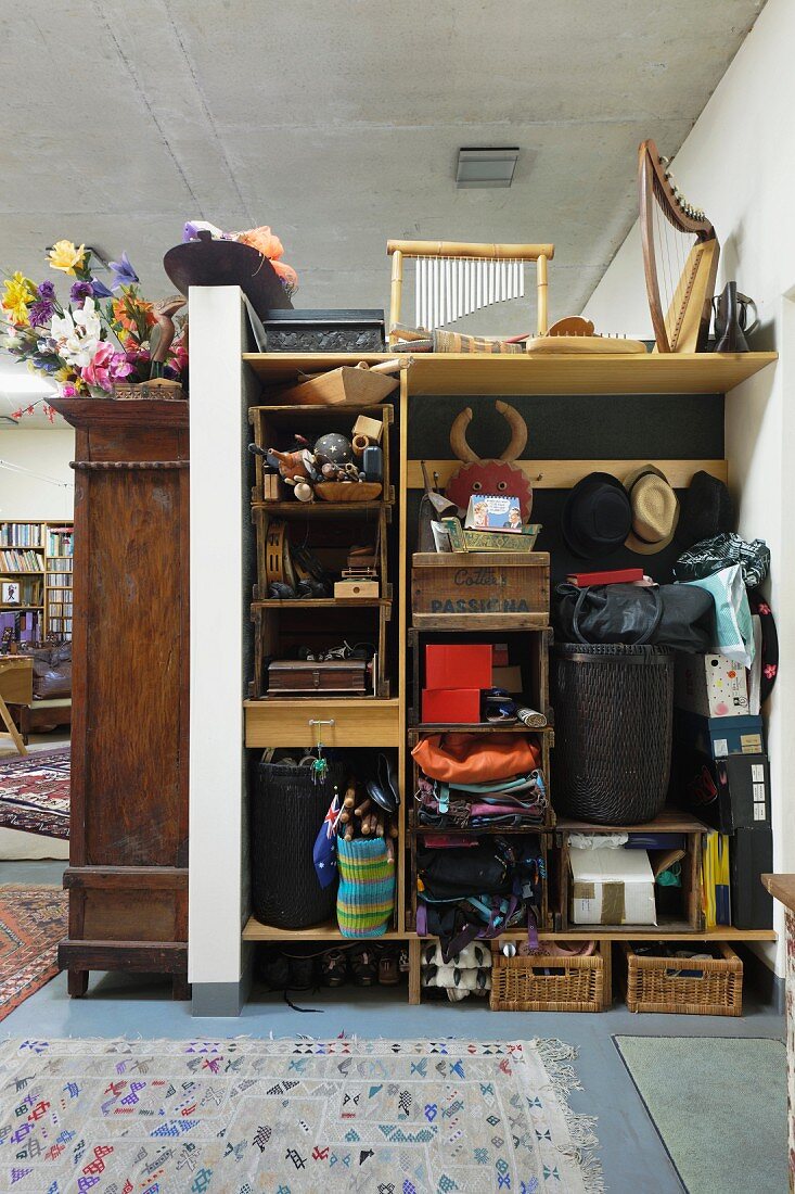 Shelves stacked with variety of objects