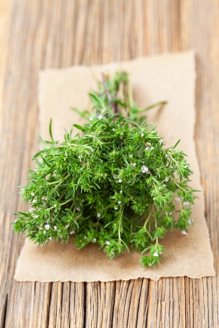 A bunch of fresh, flowering, organic savory