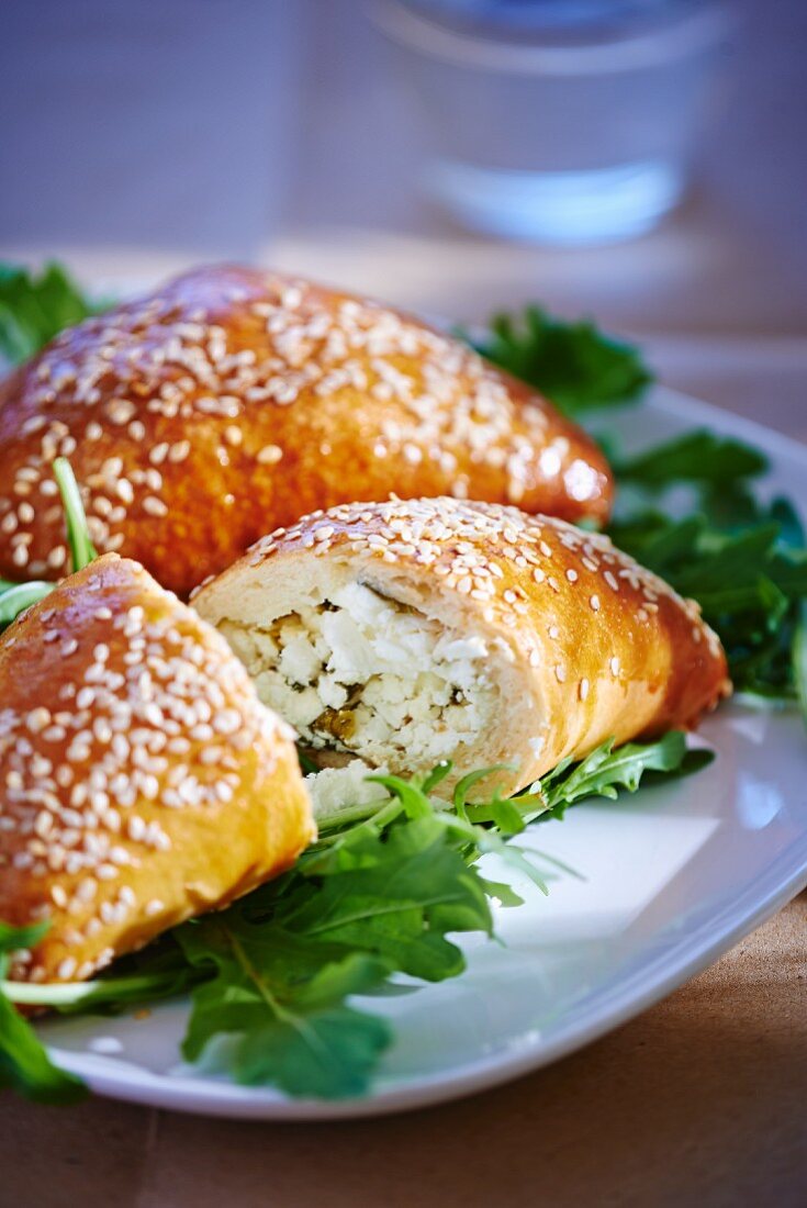 Sesame seeds turnovers filled with feta cheese