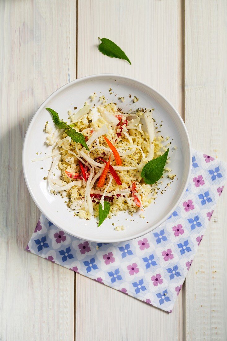 Savoury millet salad with white cabbage and strips of pepper