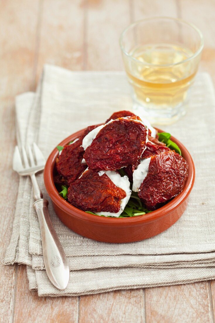 Dried tomatoes filled with cream cheese