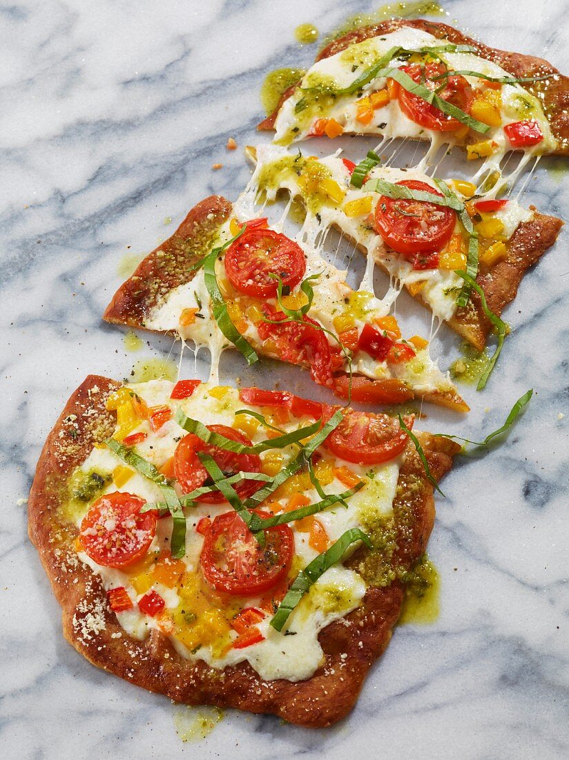 Fresh tomato pizza with basil