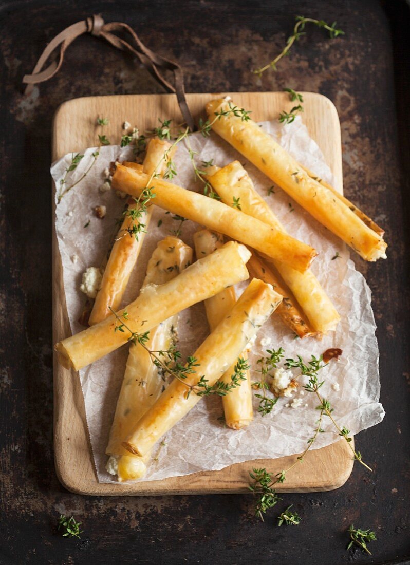 Puff pastry rolls filled with cream cheese and thyme