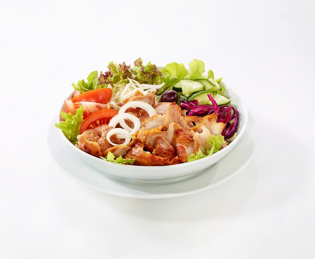 Vegetable salad with chicken donner