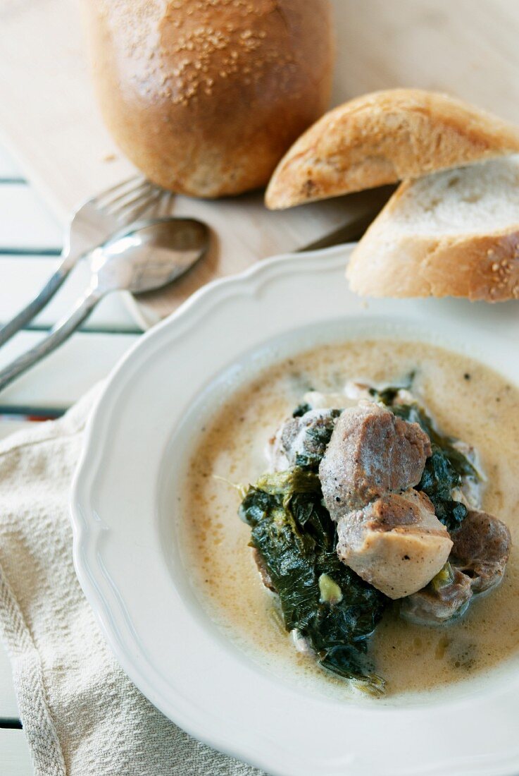 Pork fricassee with lovage (Greece)