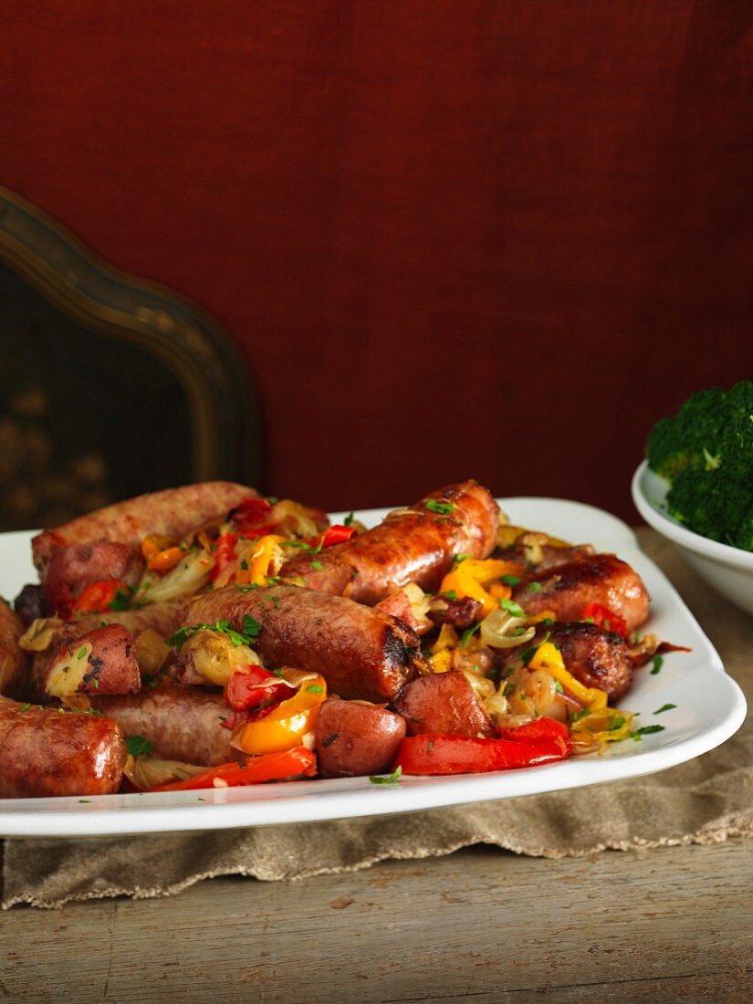 Sausages on a bed of vegetables