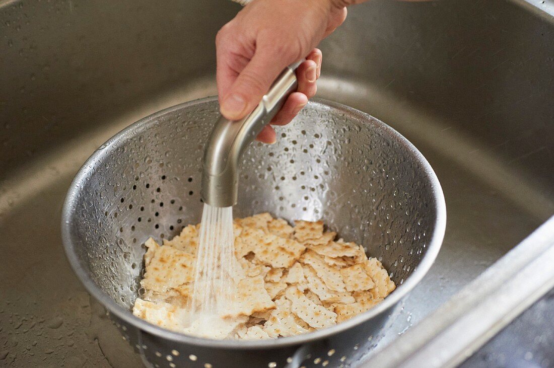 Matzo bread being softened