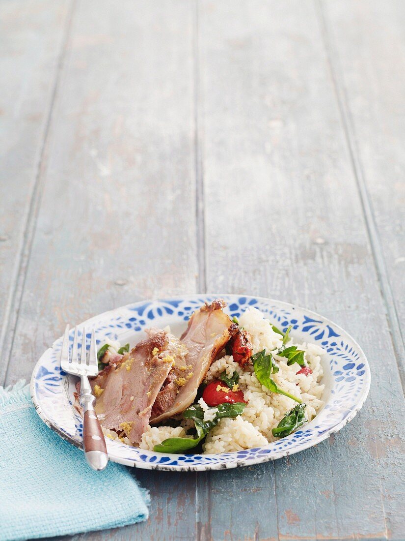 Roast lamb with spinach rice