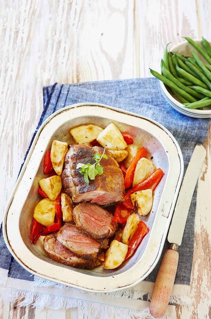 Roast lamb with potatoes and pepper