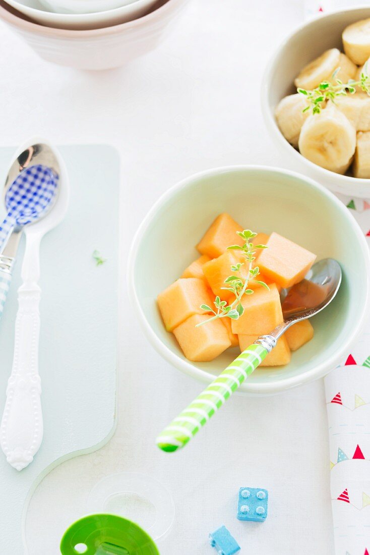 Fresh, diced melon and bananas for babies