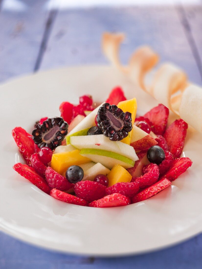 A summer fruit salad with berries