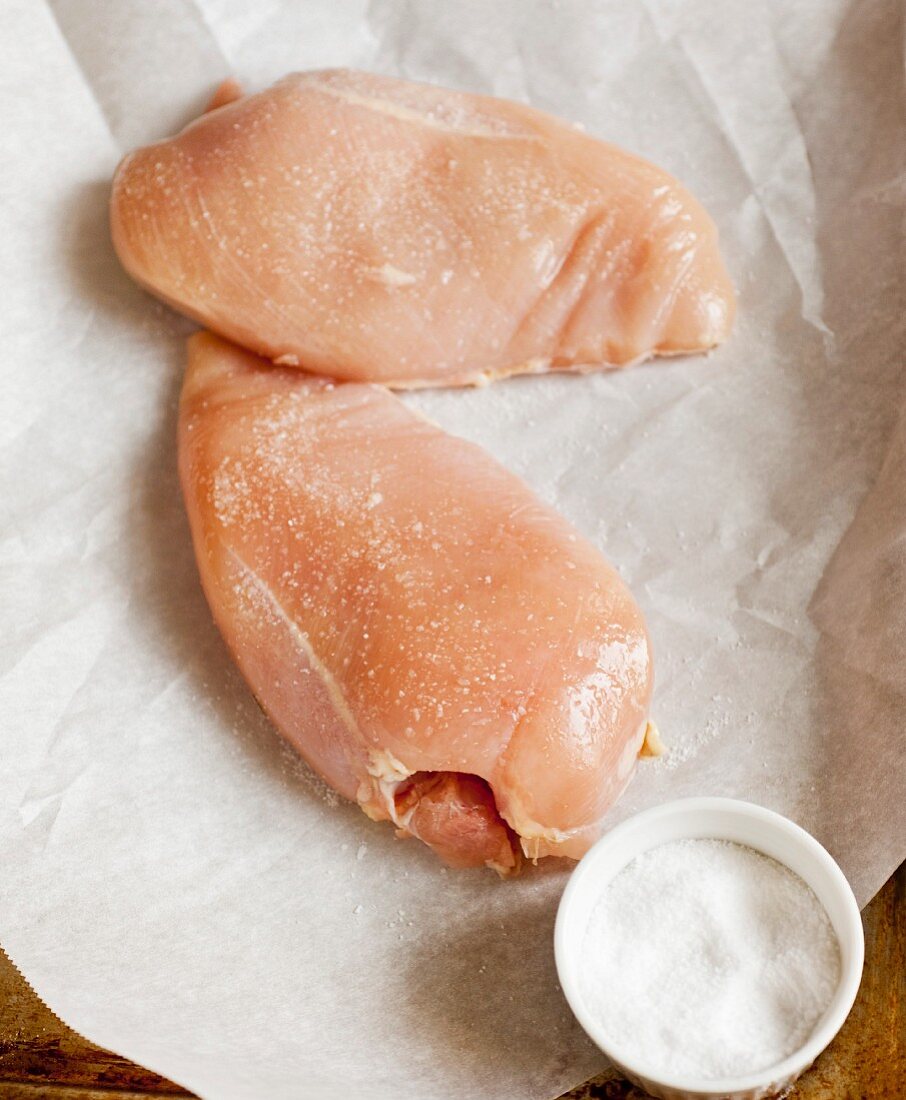 Fresh chicken breast with salt