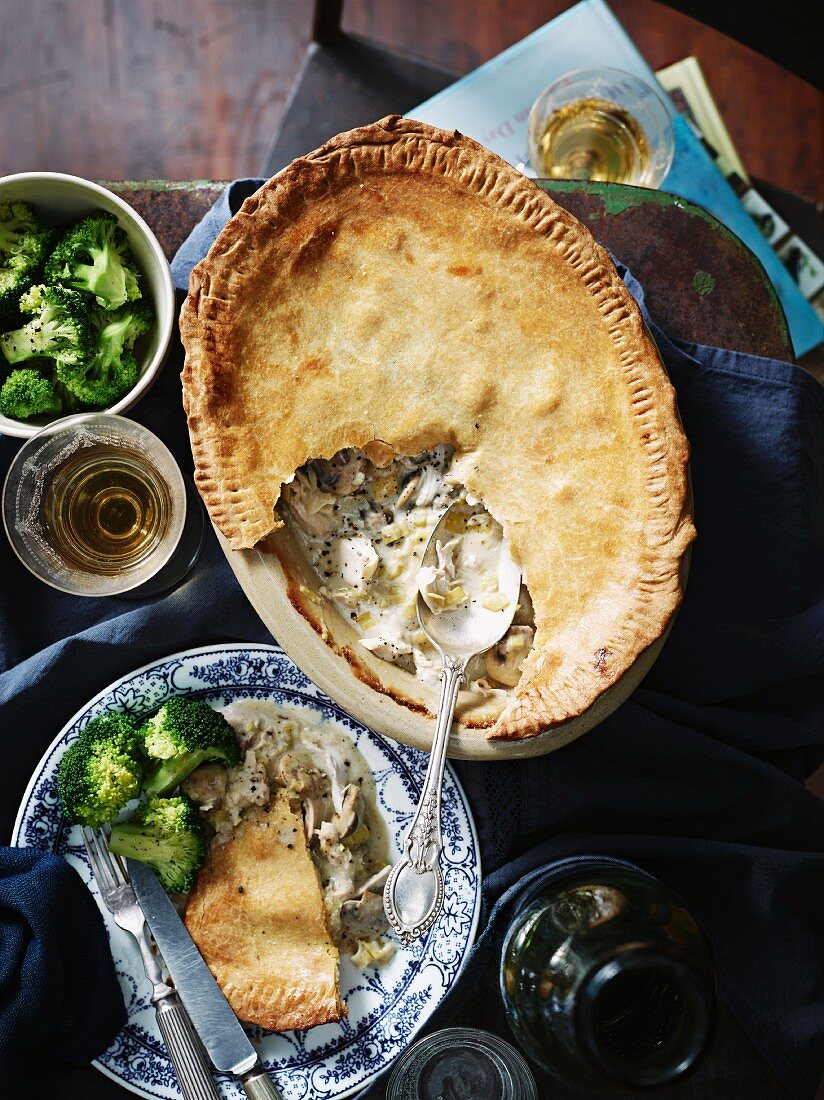 Chicken, leek and mushroom pie served with broccoli and wine