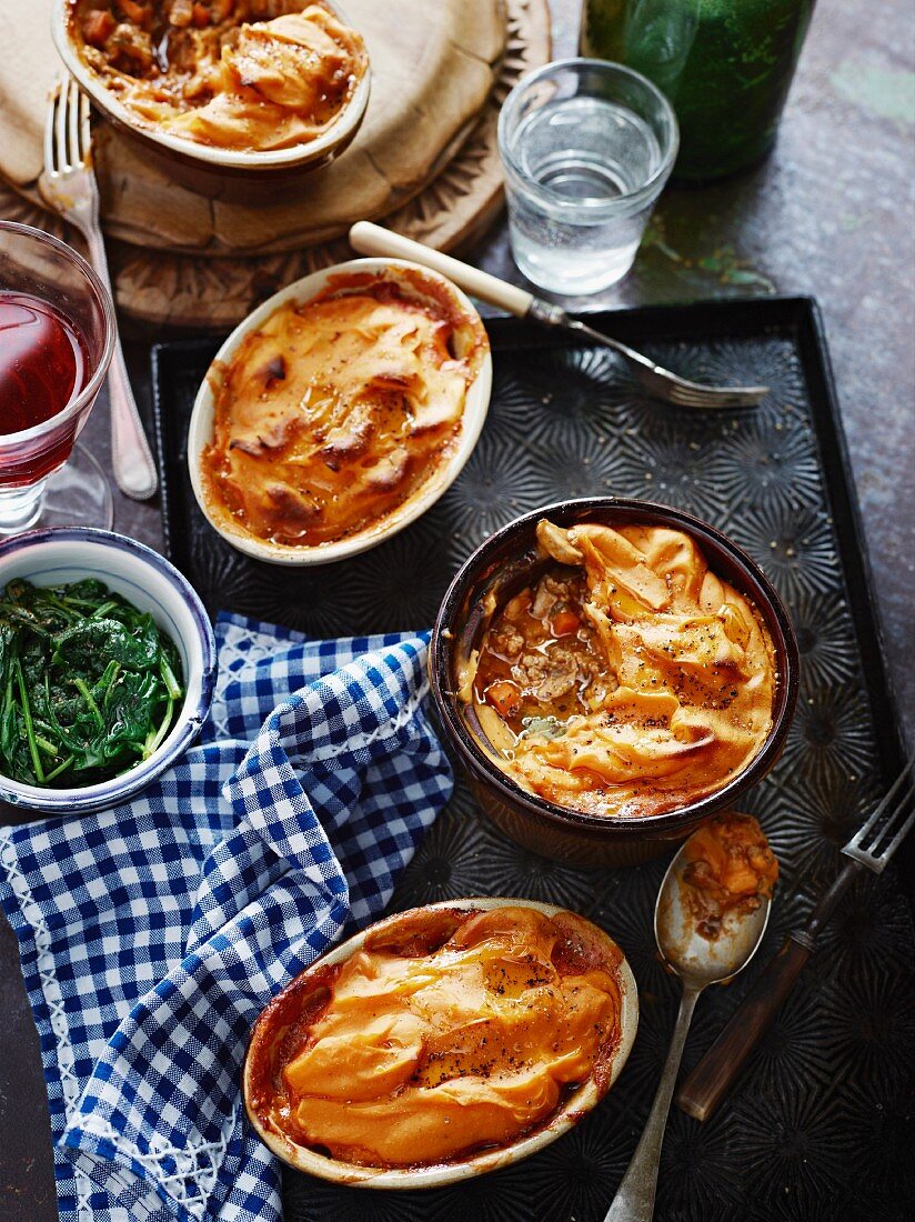 Shepherd's pie with sweet potatoes served with spinach