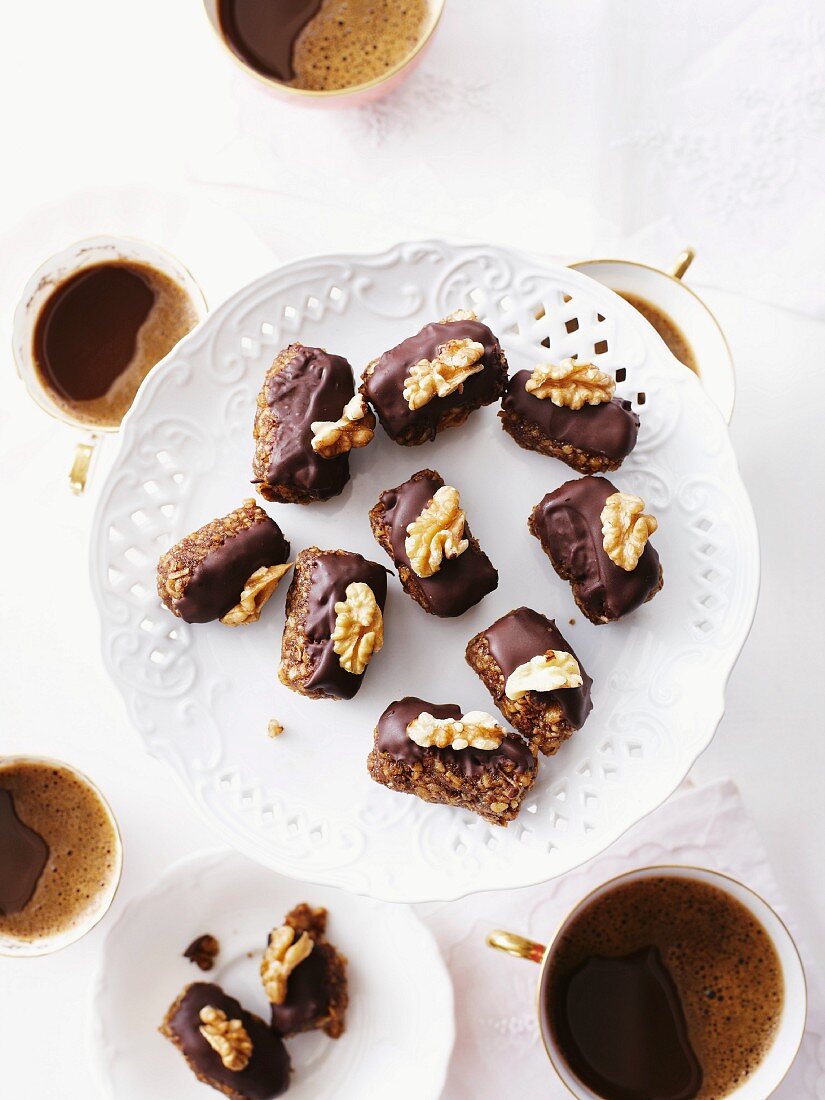 Chocolate and walnut confectionery served with coffee