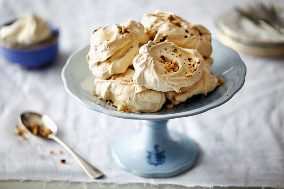 Hazelnut meringues on a cake stand