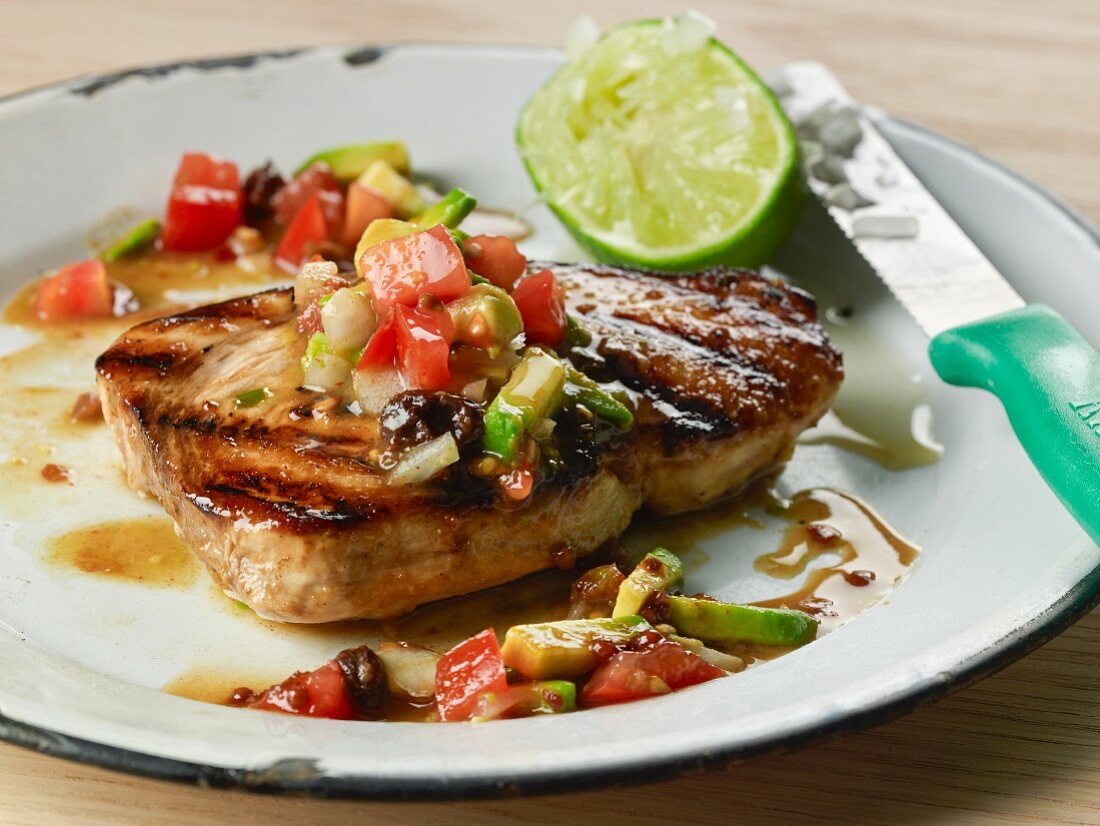 Grilled swordfish with tomato and avocado salsa